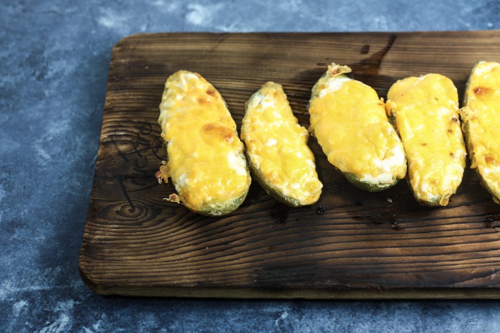 Jalapeno Poppers recipe | cream cheese stuffed in a jalapeno and topped with cheddar, cooked on the grill! | #lowcarb #ketorecipes | mincerepublic.com