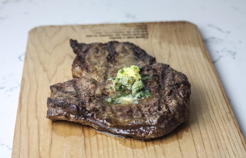 Grilled Ribeye with Garlic and Herb Compound Butter