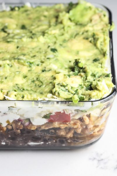 Healthy 7 Layer Dip | This healthy 7 layer dip recipe is made with black beans, ground turkey, guacamole, greek yogurt, bell pepper pico de Gallo and two types of cheese! | Keto Low Carb | mincerepublic.com
