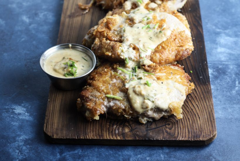 Parmesan and Pork Rinds Crusted Pork Chop with Creamy Lemon Sauce -- the best keto pork chop recipe! | #ketogenic #ketorecipes #lowcarb | mincerepublic.com