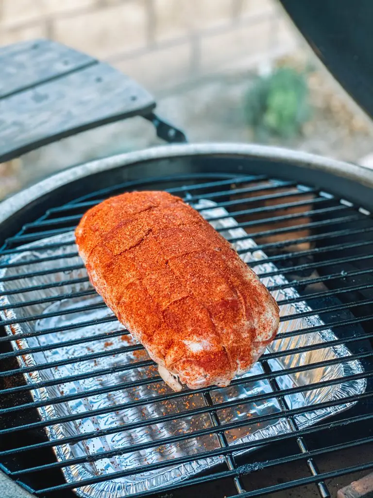 bacon weave around thanksgiving fatty on big green egg smoker