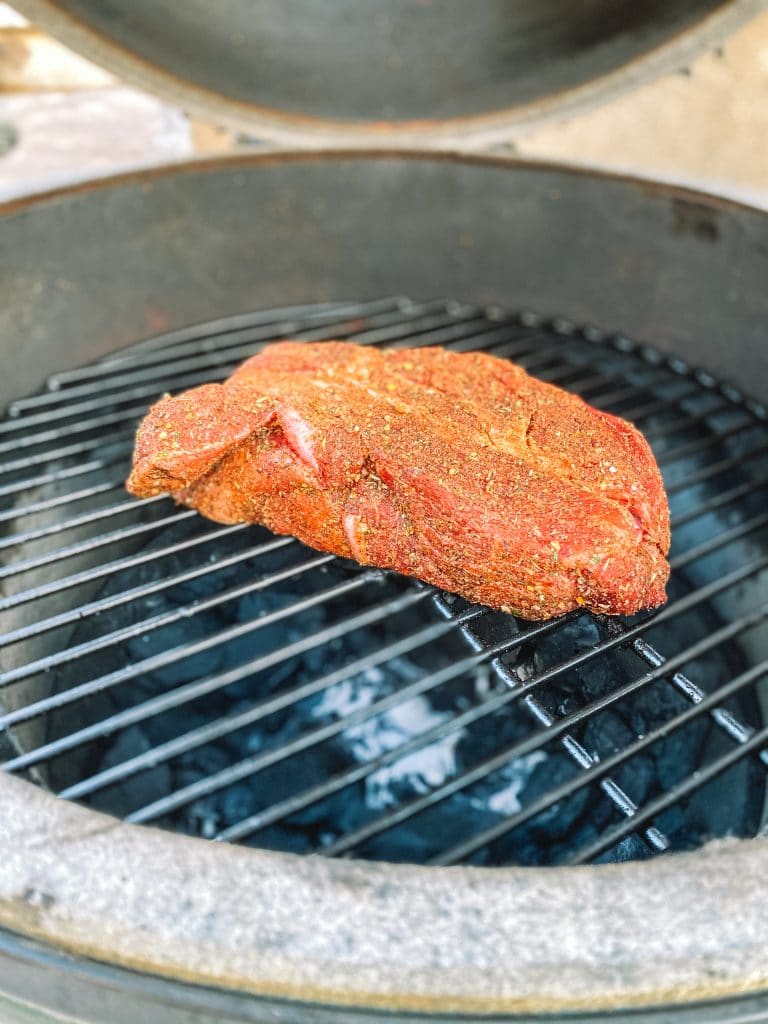 beef chuck roast on grill grate on big green egg 