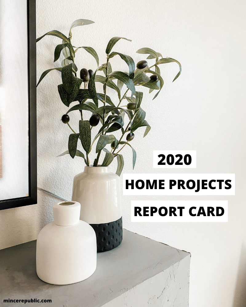 vase on fireplace with 2020 home projects report card written down